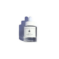 A bottle of by valenti Organics Vitamin C Elixir with a white dropper cap, set against a clean white background with a soft shadow.